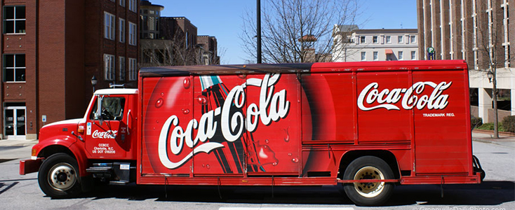 Coca Cola wrapped bottle truck